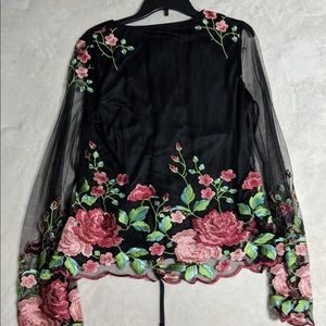 VENUS, black sheer blouse, floral design. Used